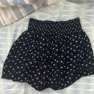 Smocked waist black floral skirt